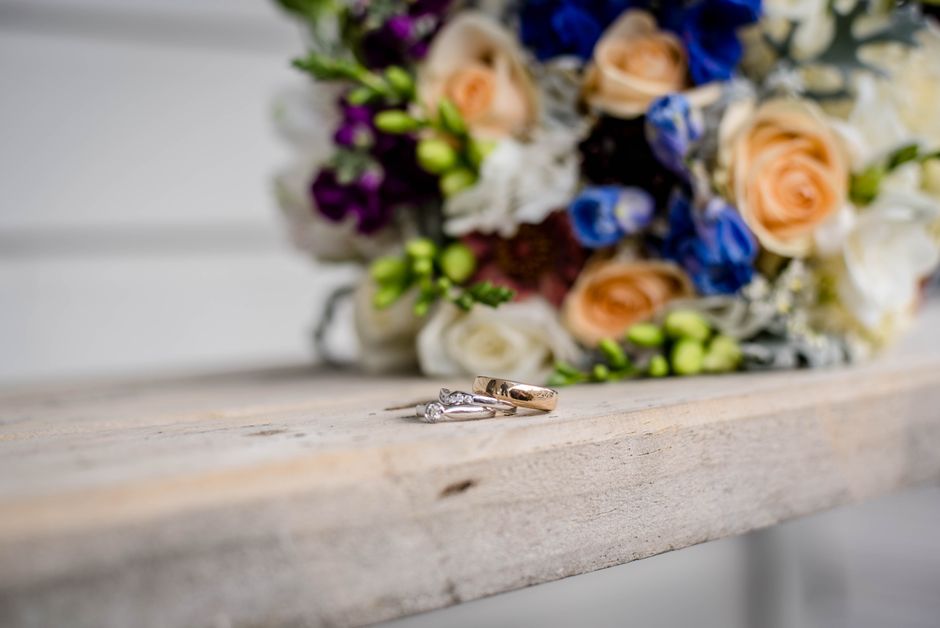 Wedding rings and bridal bouquet