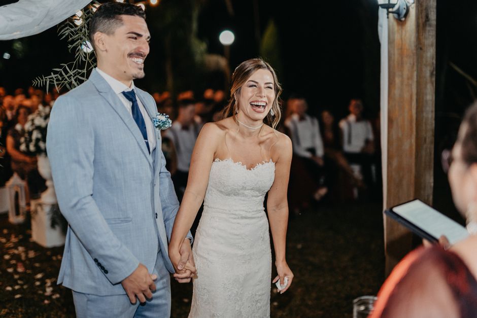 Bride and groom laughing together